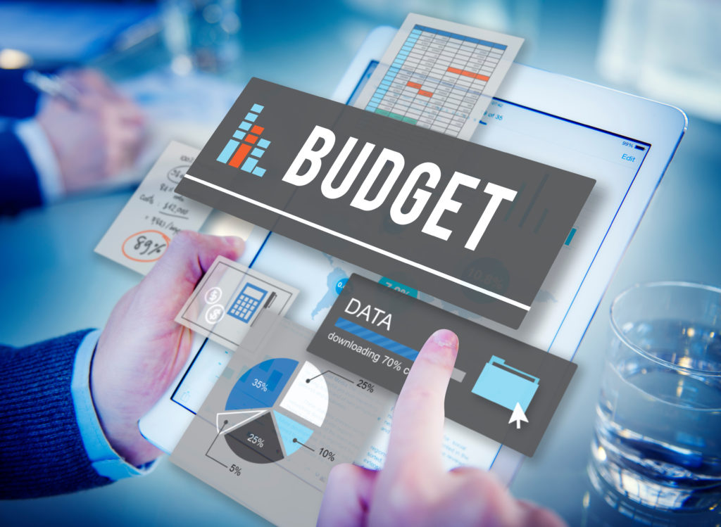 cartoon image of the word budget on top of a tablet screen